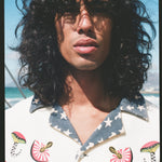 close up portrait of man staring straight on 