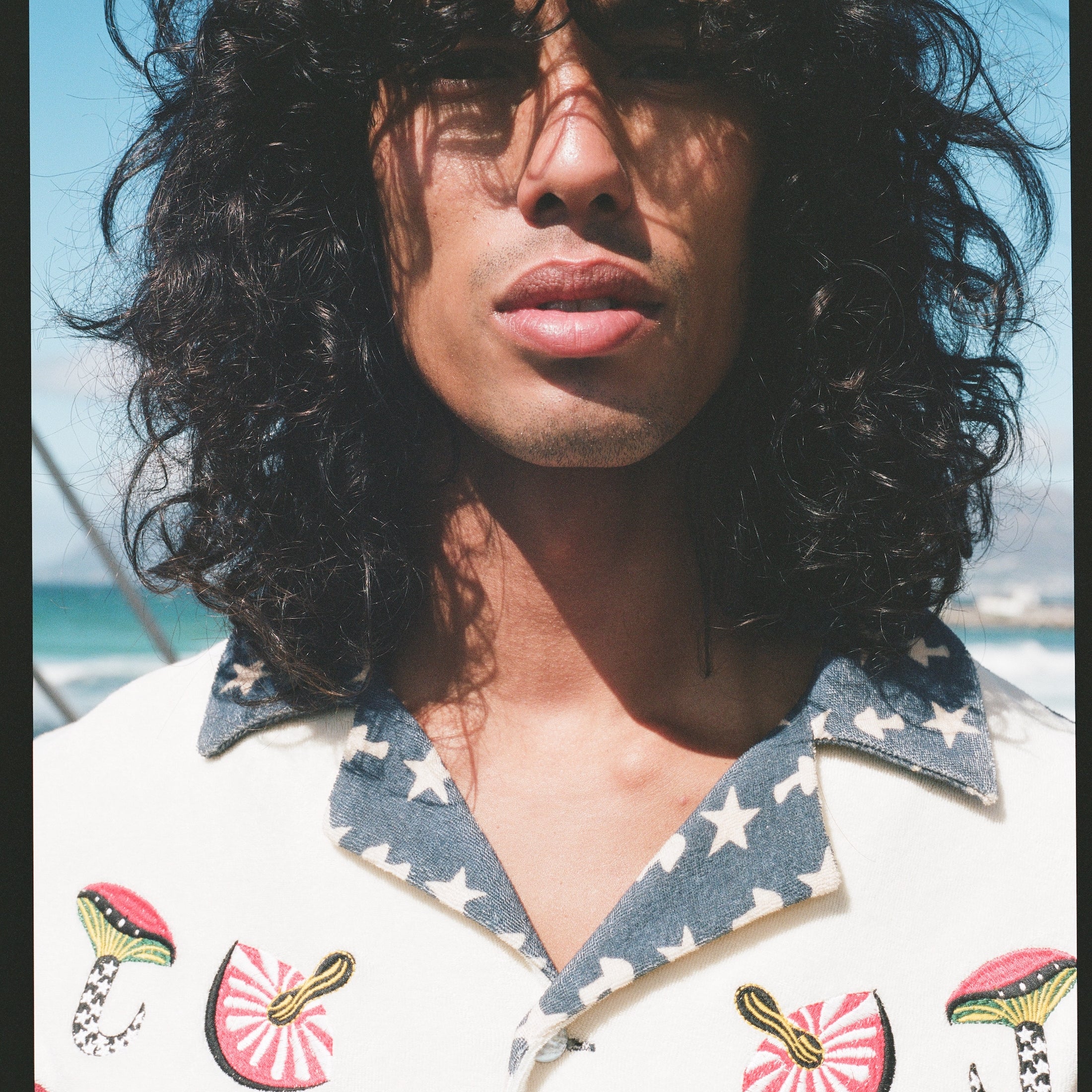 close up portrait of man staring straight on 