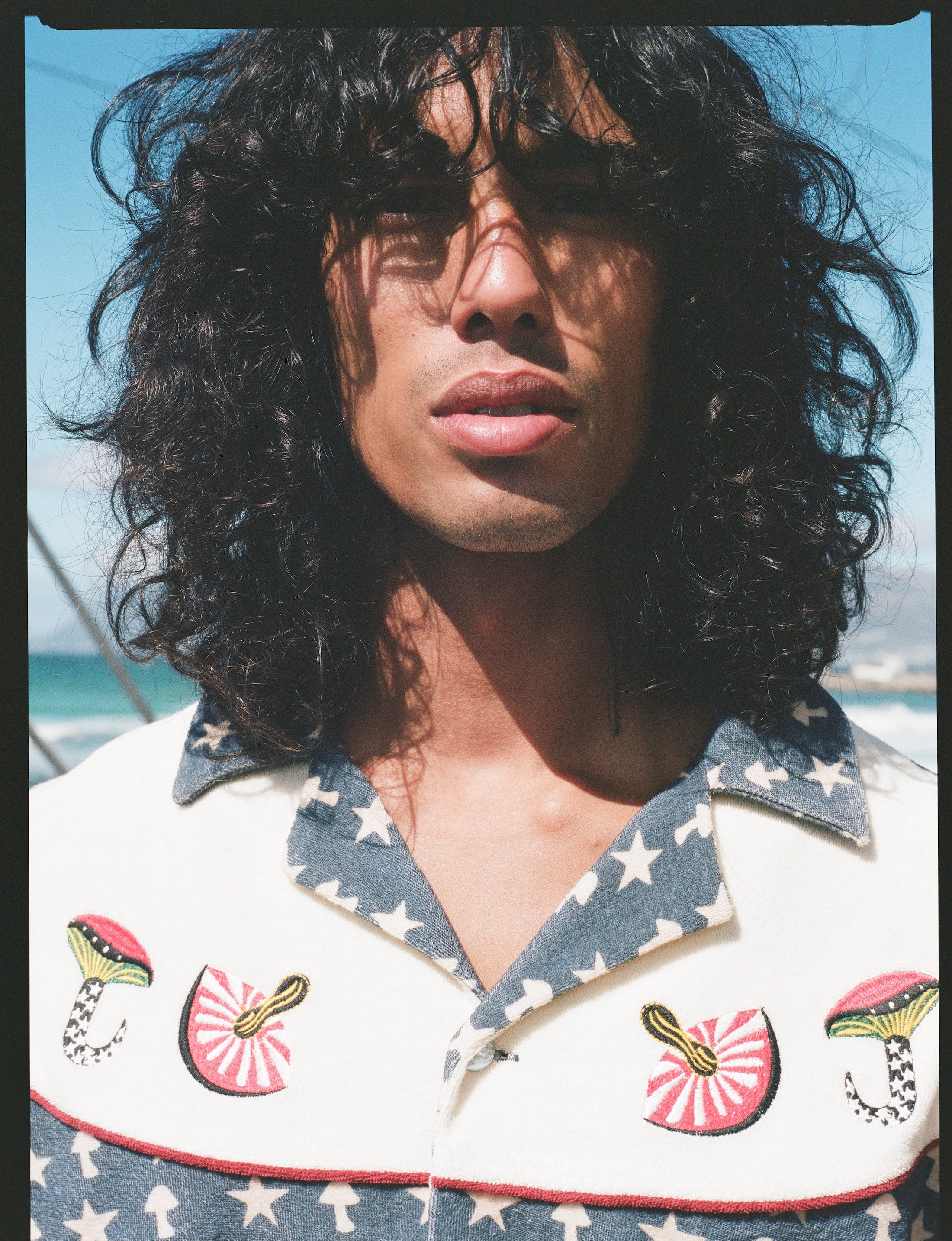 close up portrait of man staring straight on 