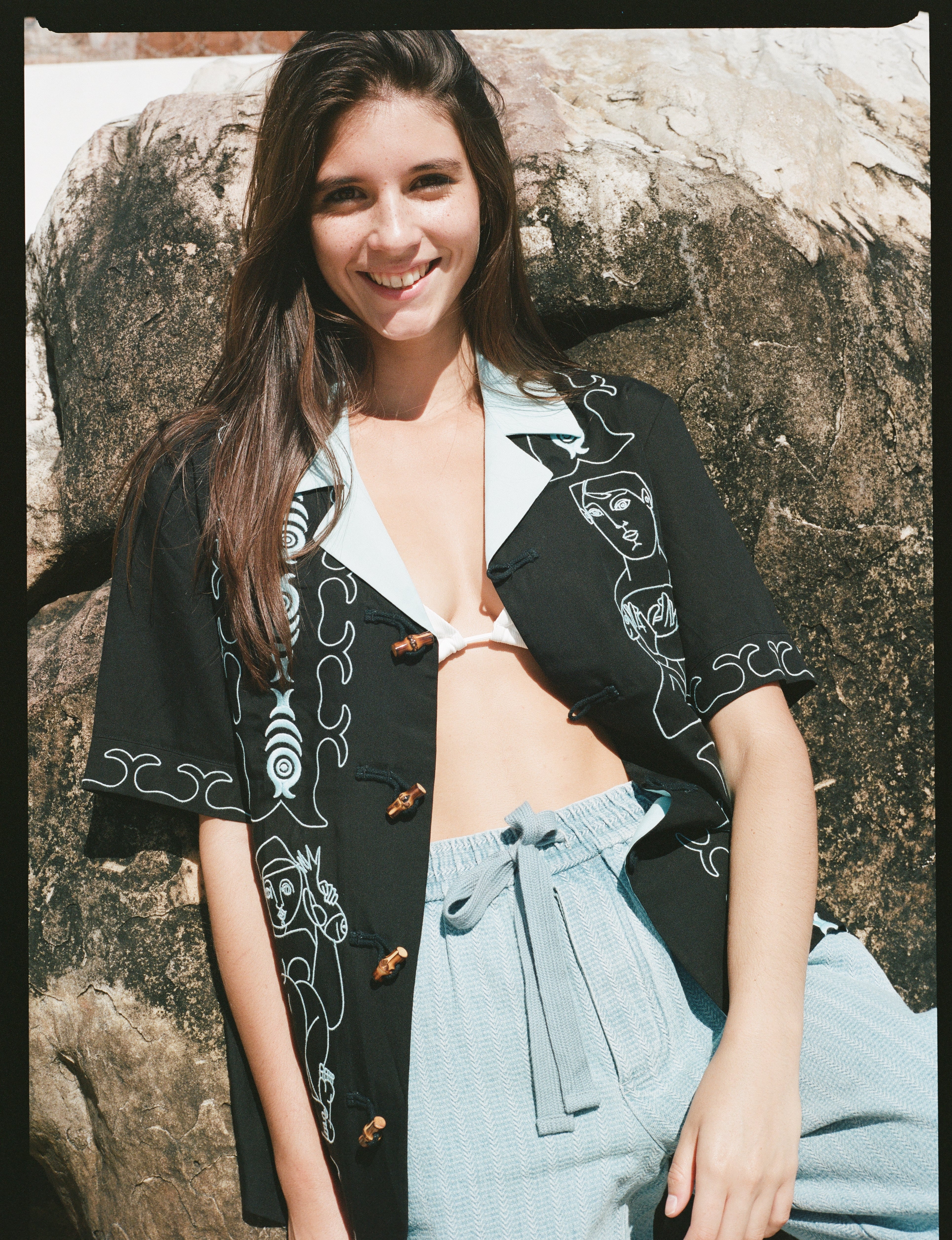 Marie de Buttet jet black shirt with woman smiling