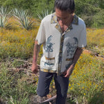 Video of man walking through agave field wearing Alexis Zambrano shirt