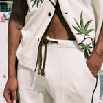 close up of matching set with hand in pocket