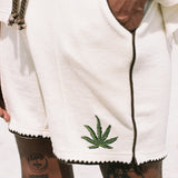 close up of hand in pocket of shorts