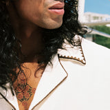 close up of mans face and collar of shirt