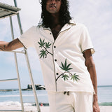 man looks at camera wearing full matching set