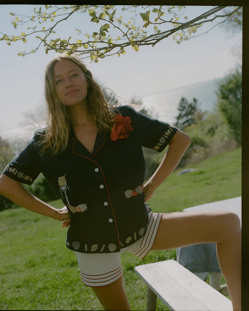 Female model wearing the crop cut vongole top