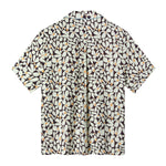 Back view of sunny disposition shirt featuring a box pleat