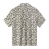 Back view of sunny disposition shirt featuring a box pleat