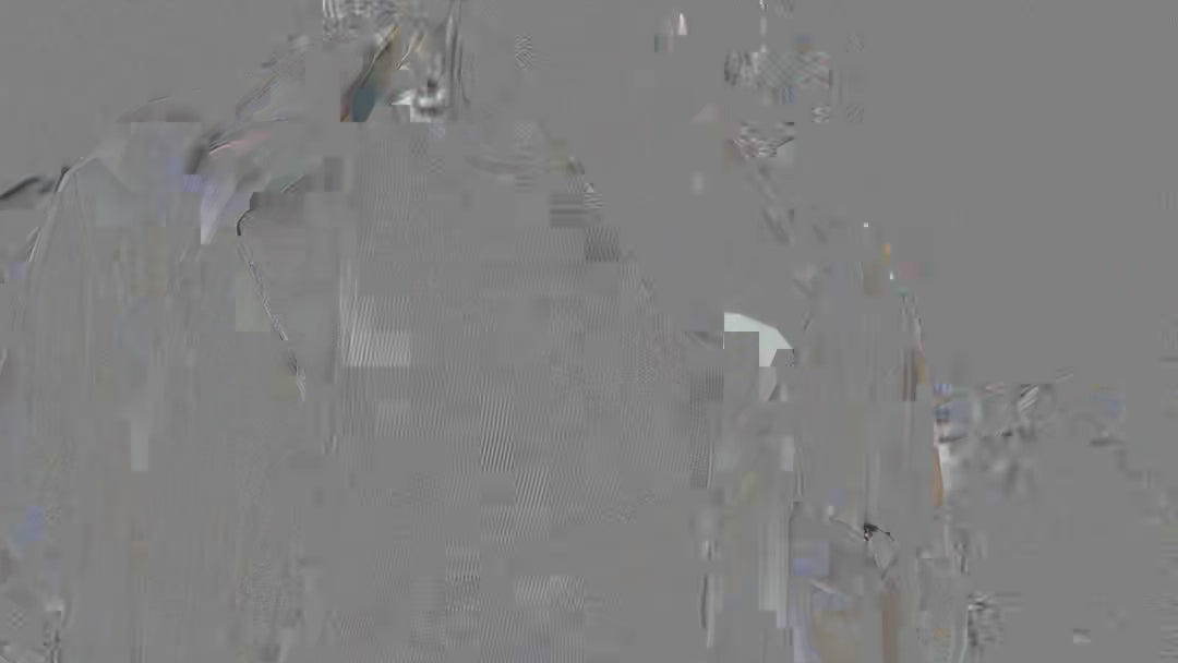 video of male model spinning and grinning in his billowy parchment cabrisa
