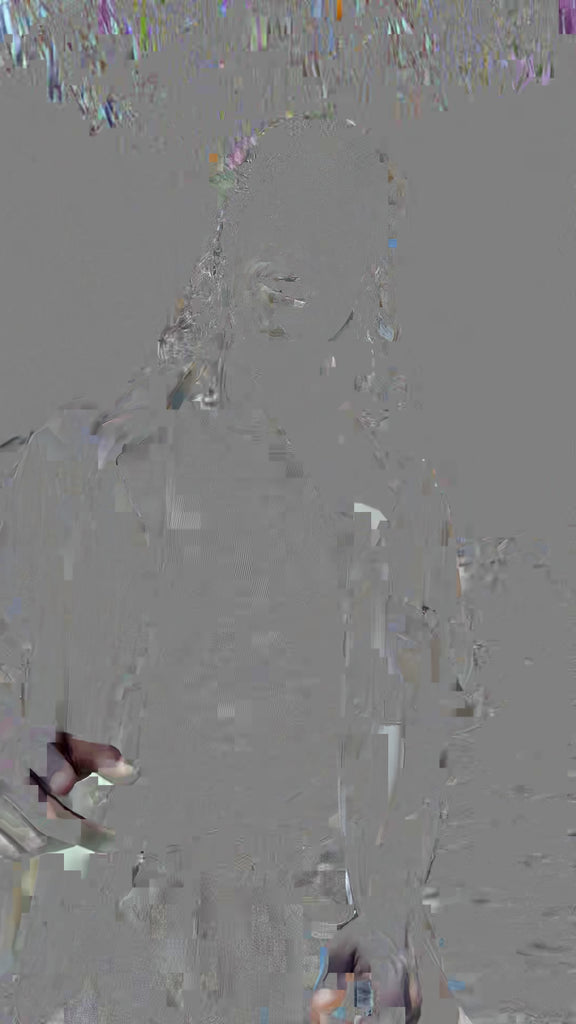 video of male model spinning and grinning in his billowy parchment cabrisa