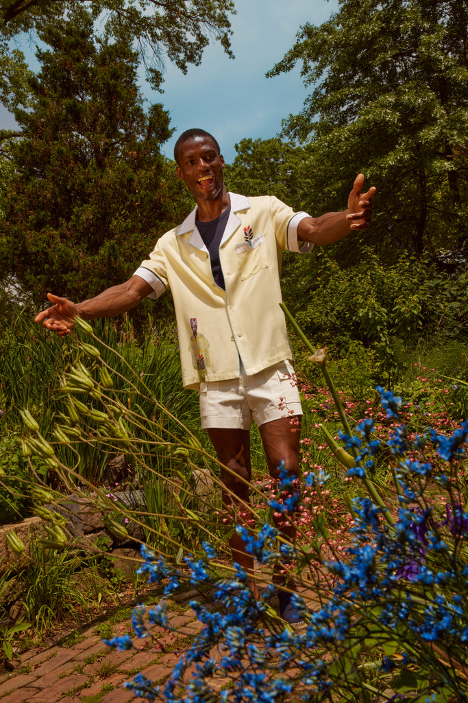 Man puts arms out towards camera