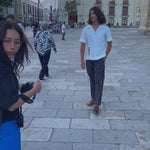 Video of man walking through town wearing baby blue Tombolo Martini shirt