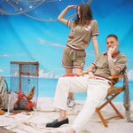 take the seaside with you anywhere in this organic cotton terry cloth matching set for both men and women with fun embroidered lighthouse and lobster motifs