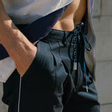Male model wearing the pants tied 
