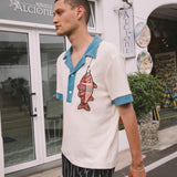 Male model wearing pop over with navy easy going pants 