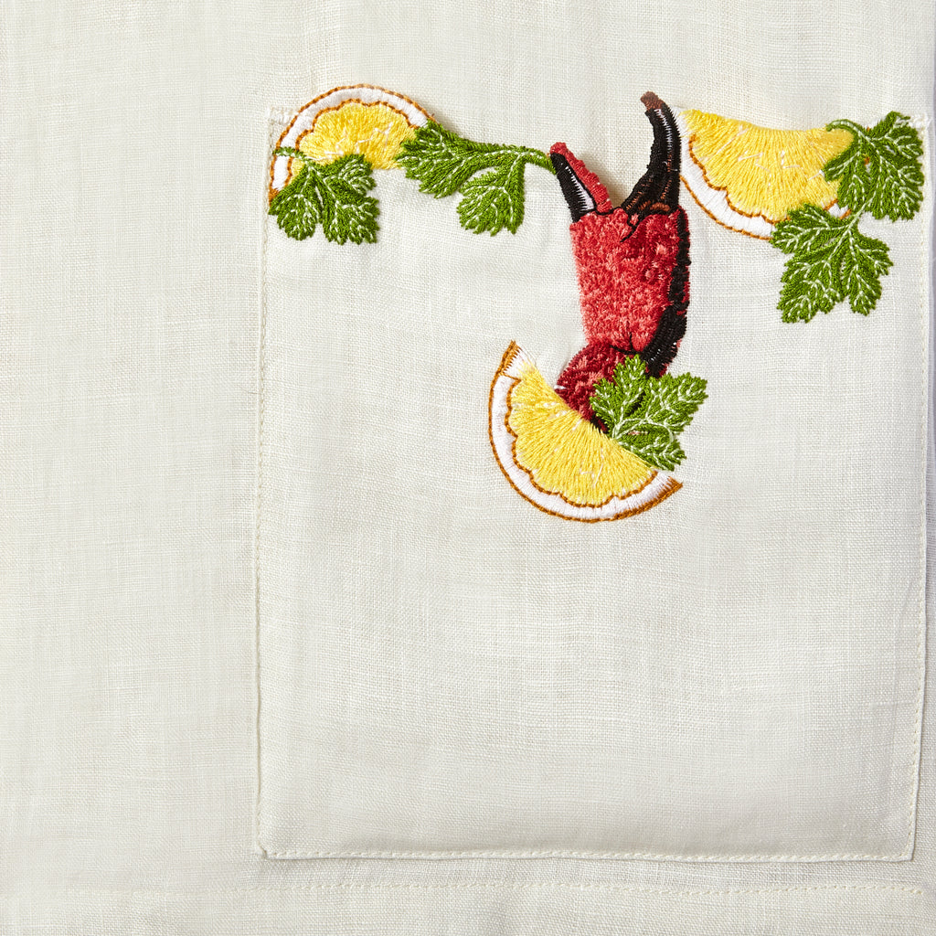 Close up of crab claw embroidered on shirt pocket
