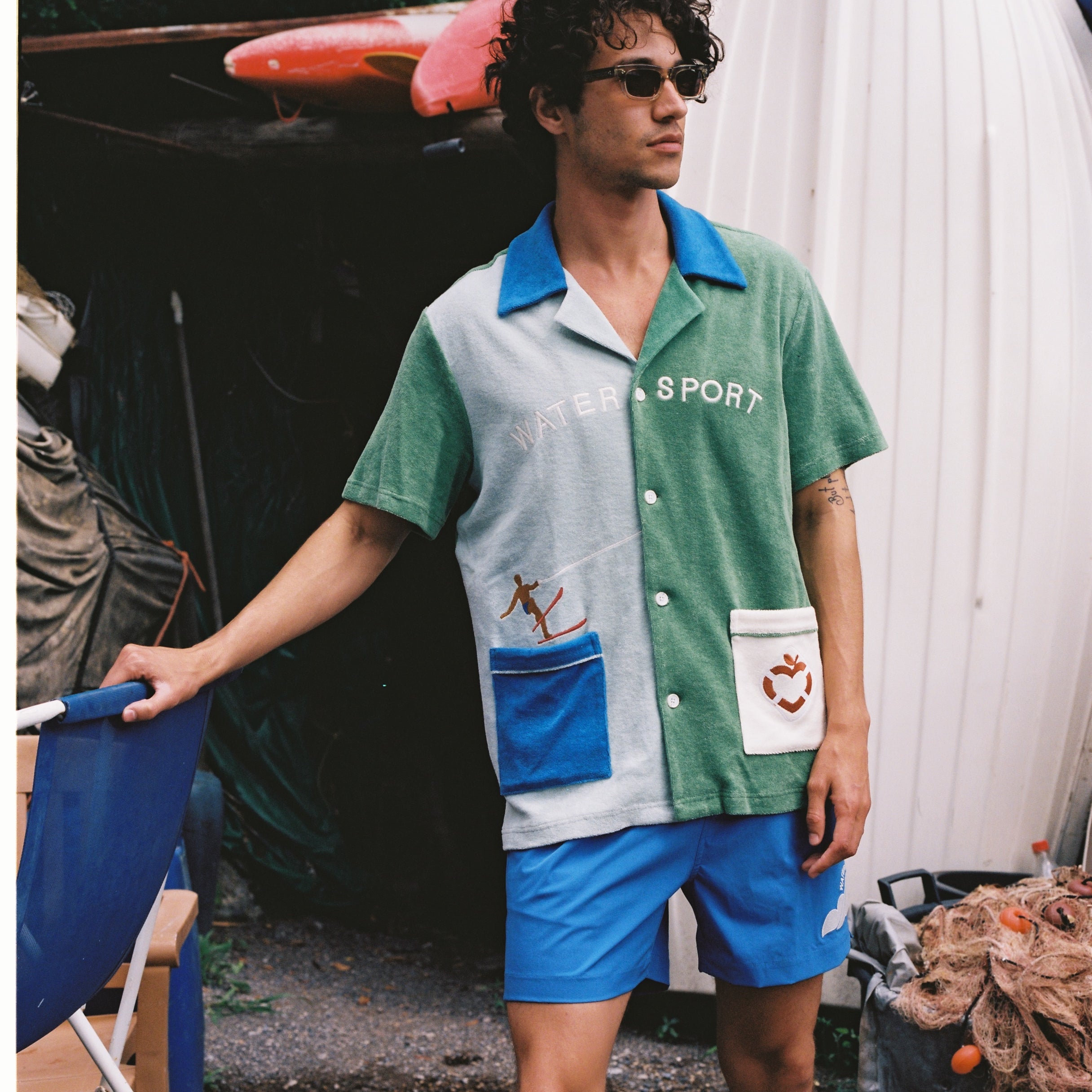 Male model wearing the water sport cabana along with the matching shorts