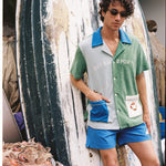 Male model in full set with his hand in the left cabana pocket