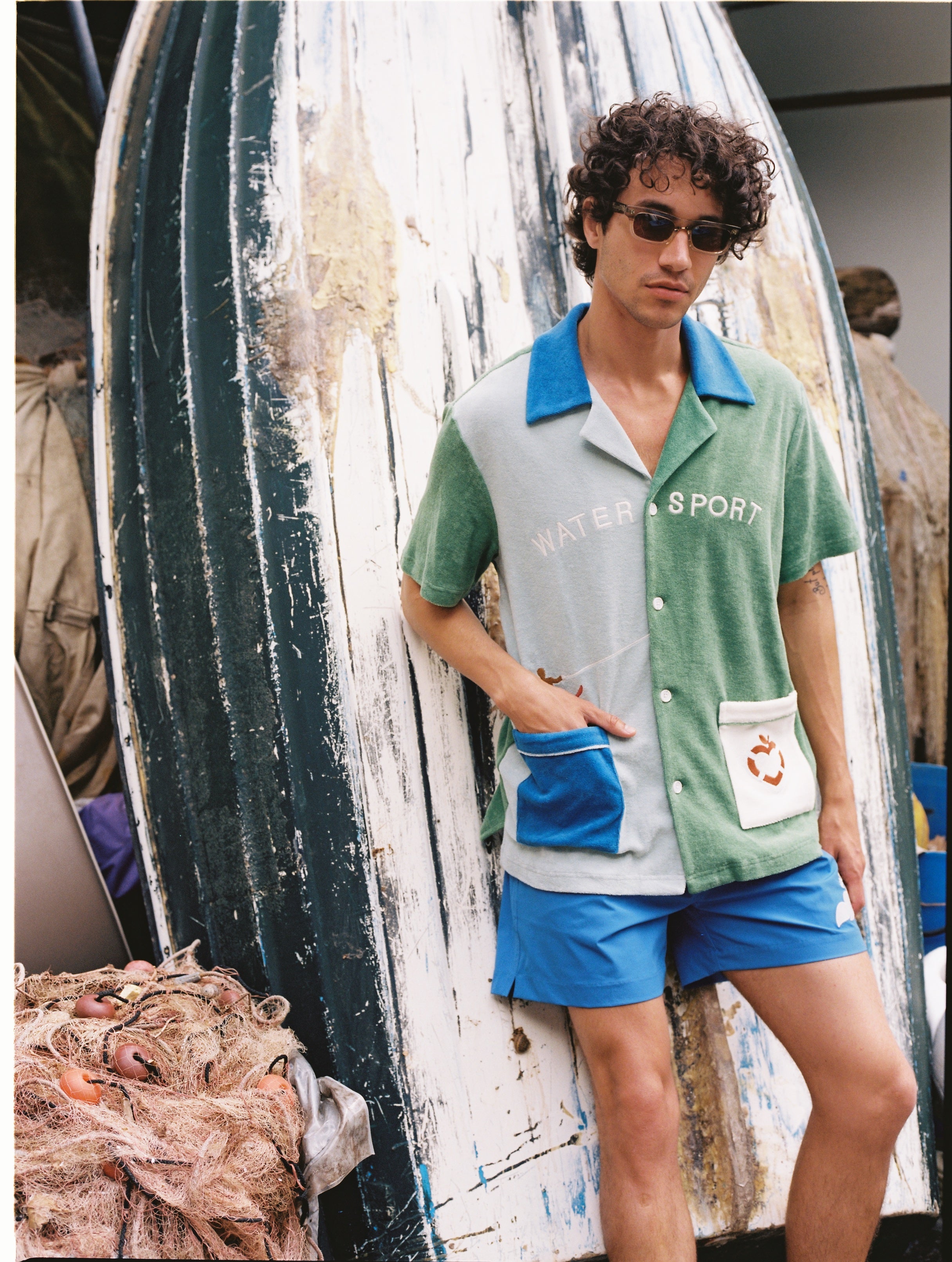 Male model in full set with his hand in the left cabana pocket