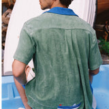 Back view of the shirt on a male model