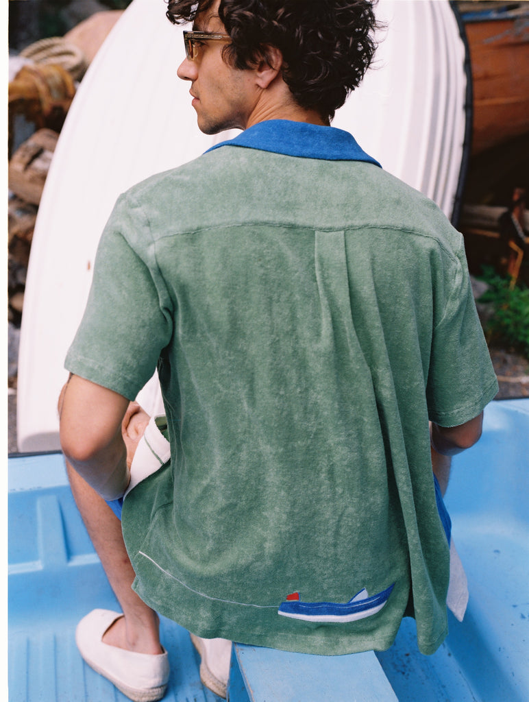 Back view of the shirt on a male model