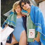 female and male models sharing the water sport towel