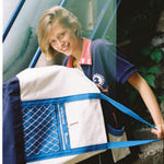 female model holding tote bag in her lap