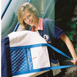 female model holding tote bag in her lap