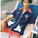 Male model in beach chair in dive cabana