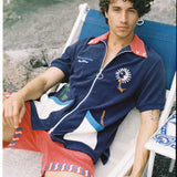 Male model in beach chair in dive cabana