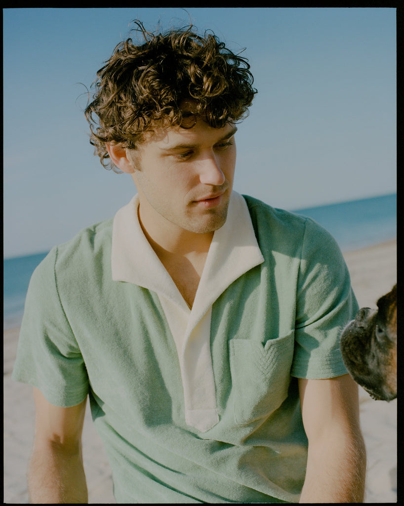 Man stares at dog in close up shot