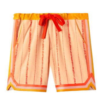 lay flat product photo of shorts showing orange contrasts