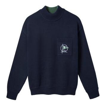 Product photo of navy Tombolo Mariner sweater with green flag embroidered on chest pocket against white backdrop