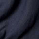 Close up image of the navy linen used to make the shirt