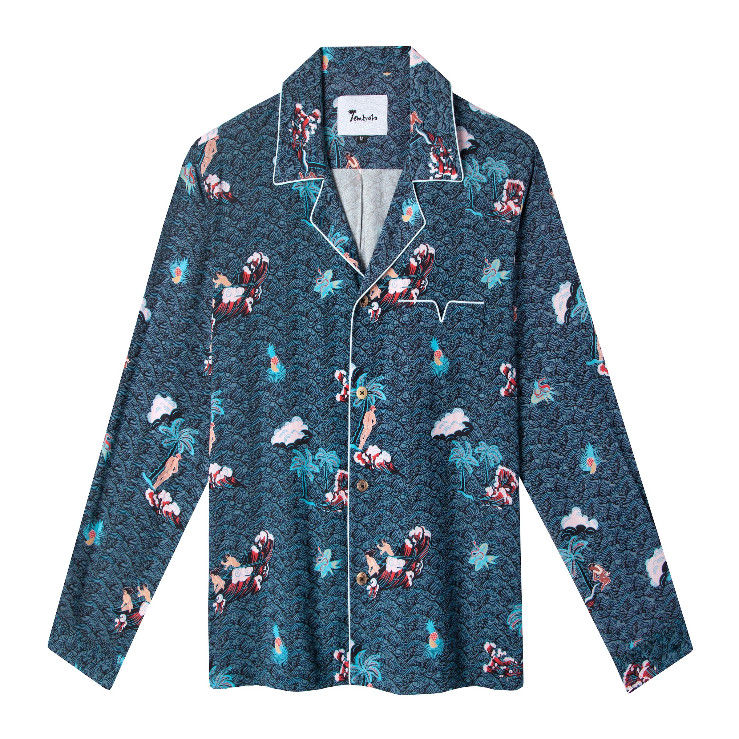 Front lay flat view of shirt with recurring pink Adam and Eve in a tropical garden of Eden print over blue waves with white piping along pocket and collar
