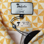 Tombolo x wole limited edition label