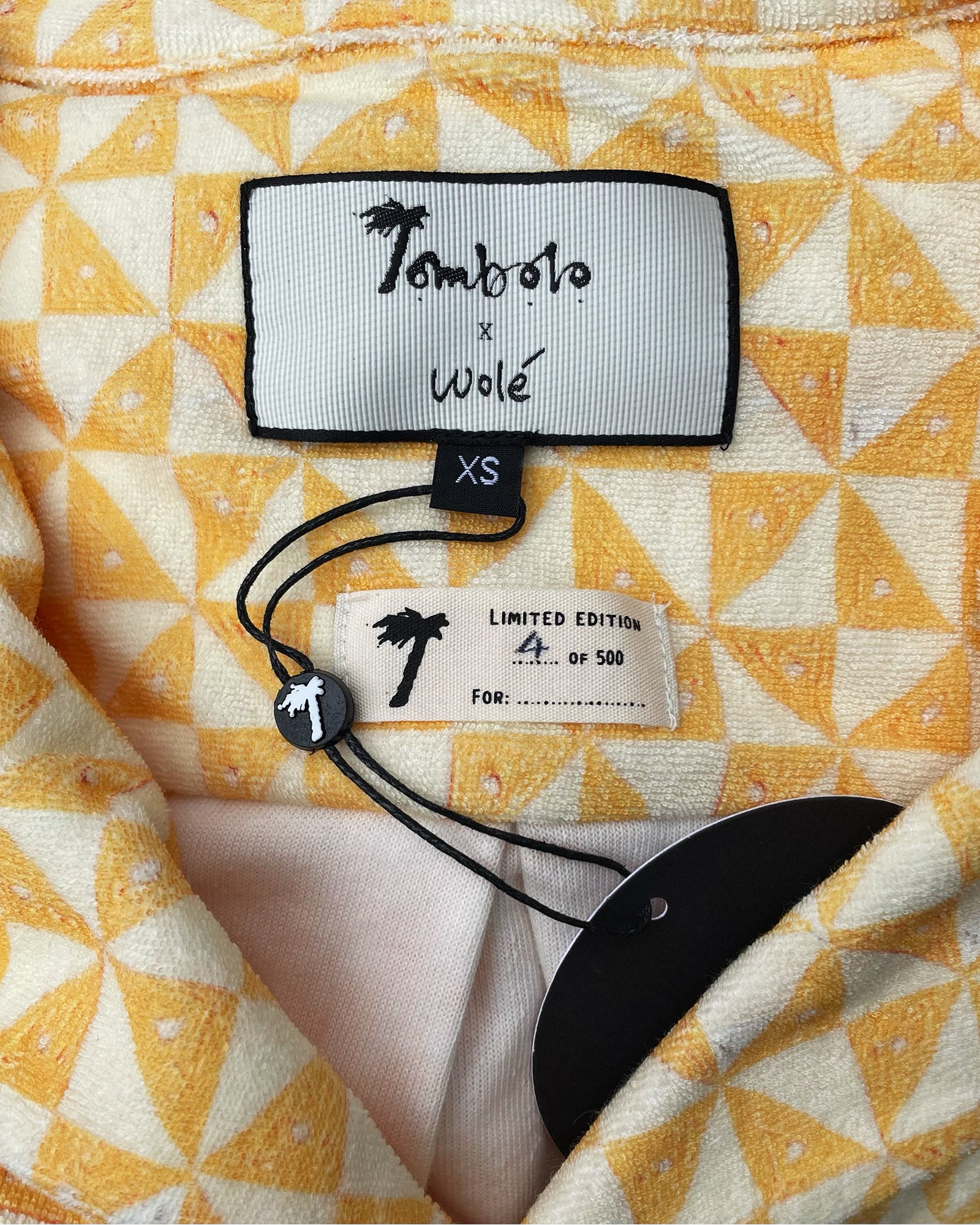 Tombolo x wole limited edition label