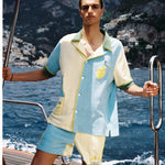 Male model wearing limoncello set on a boat off the coast of positano