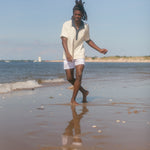 Man caught mid motion at the beach