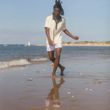 Man caught mid motion at the beach
