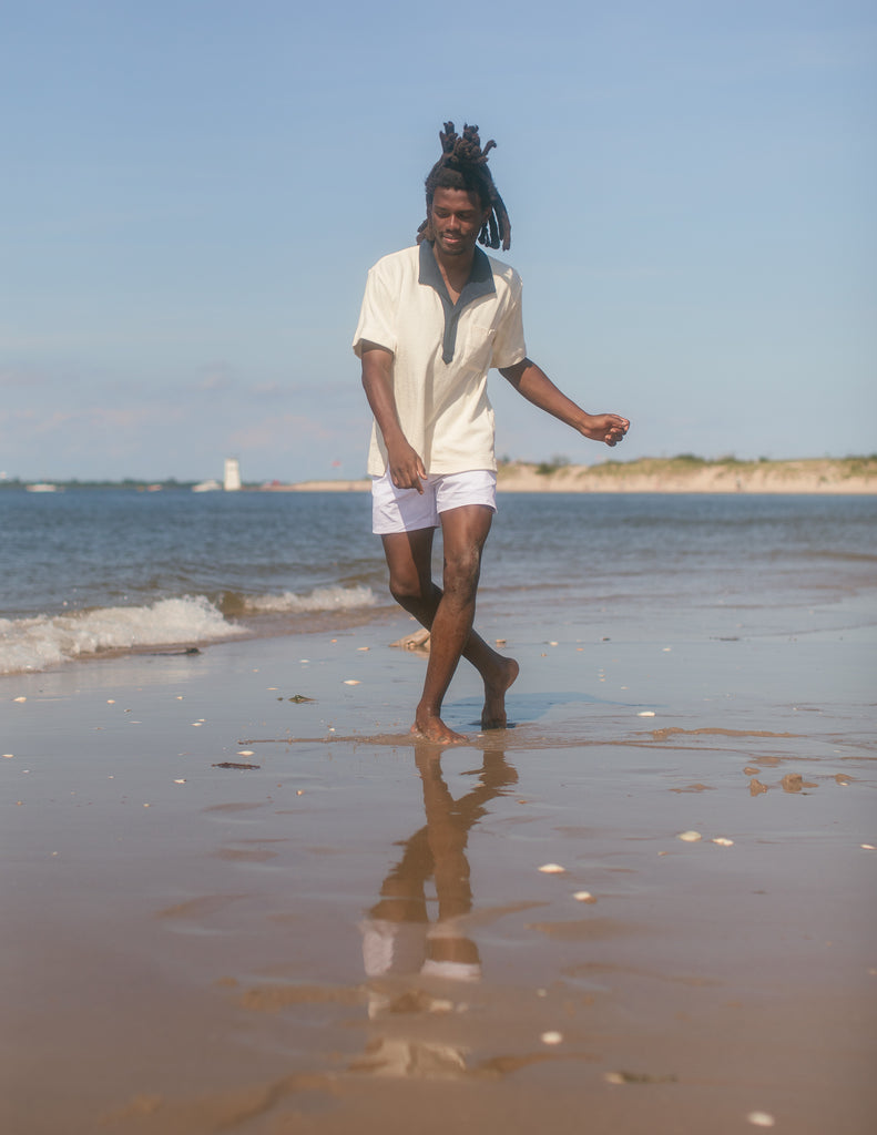Man caught mid motion at the beach