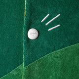 close up of Tombolo golfball button