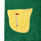 Close up of the patch pocket representing a bunker with flag embroidery