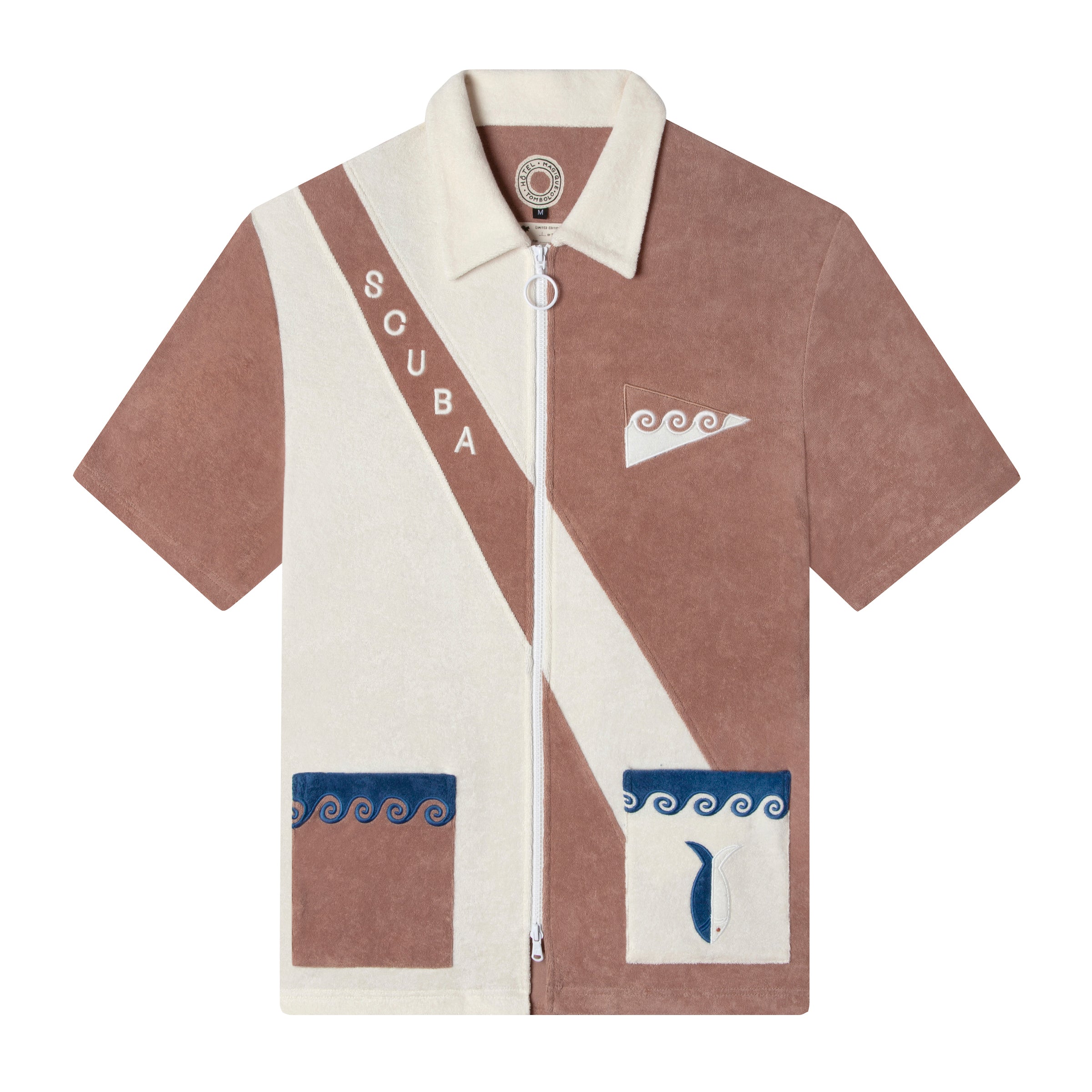 Crafted from 100% organic cotton terry cloth, this three-piece set features waves, fish, and 'SCUBA' embroidery, along with matching pants and a bucket hat.