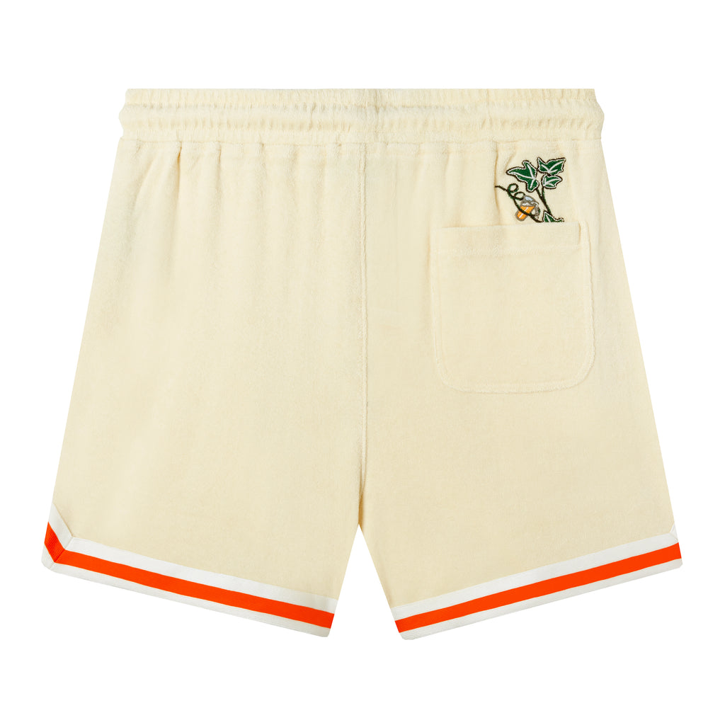 Back side of shorts, showing an ivy vine with a tiny beer pitcher peeking out of the back pocket