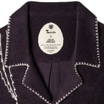 Terry cloth beach shirt from Tombolo and Agua Magica perfect for sipping mezcal