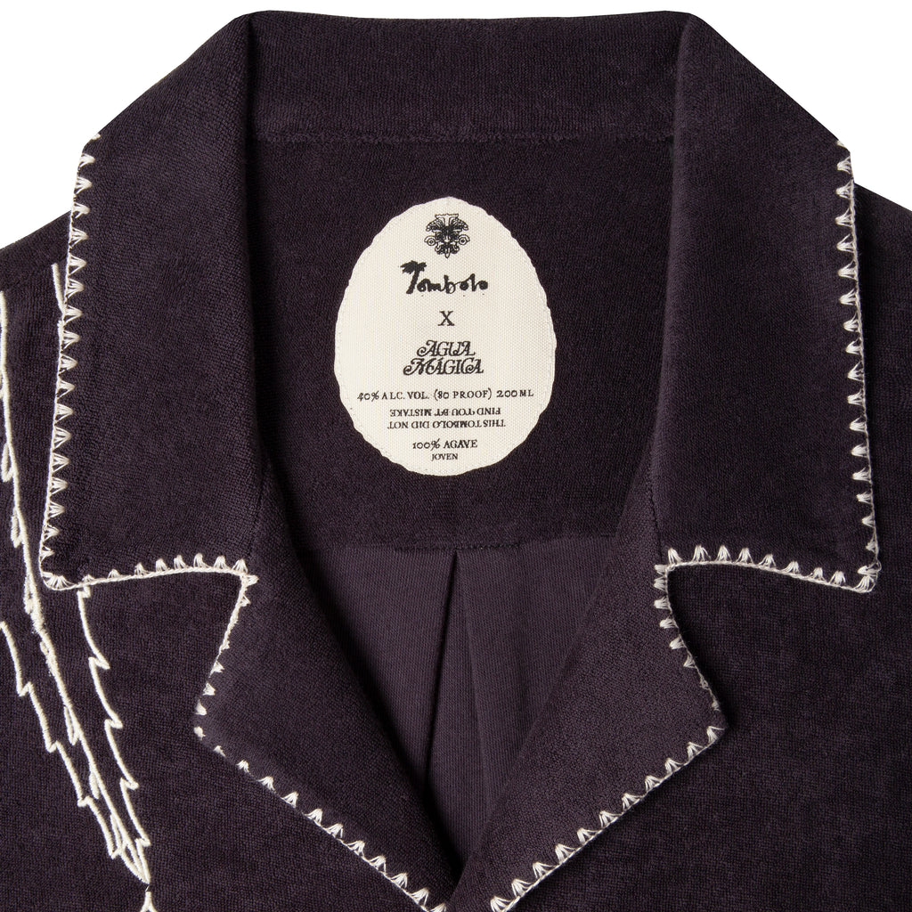 Terry cloth beach shirt from Tombolo and Agua Magica perfect for sipping mezcal