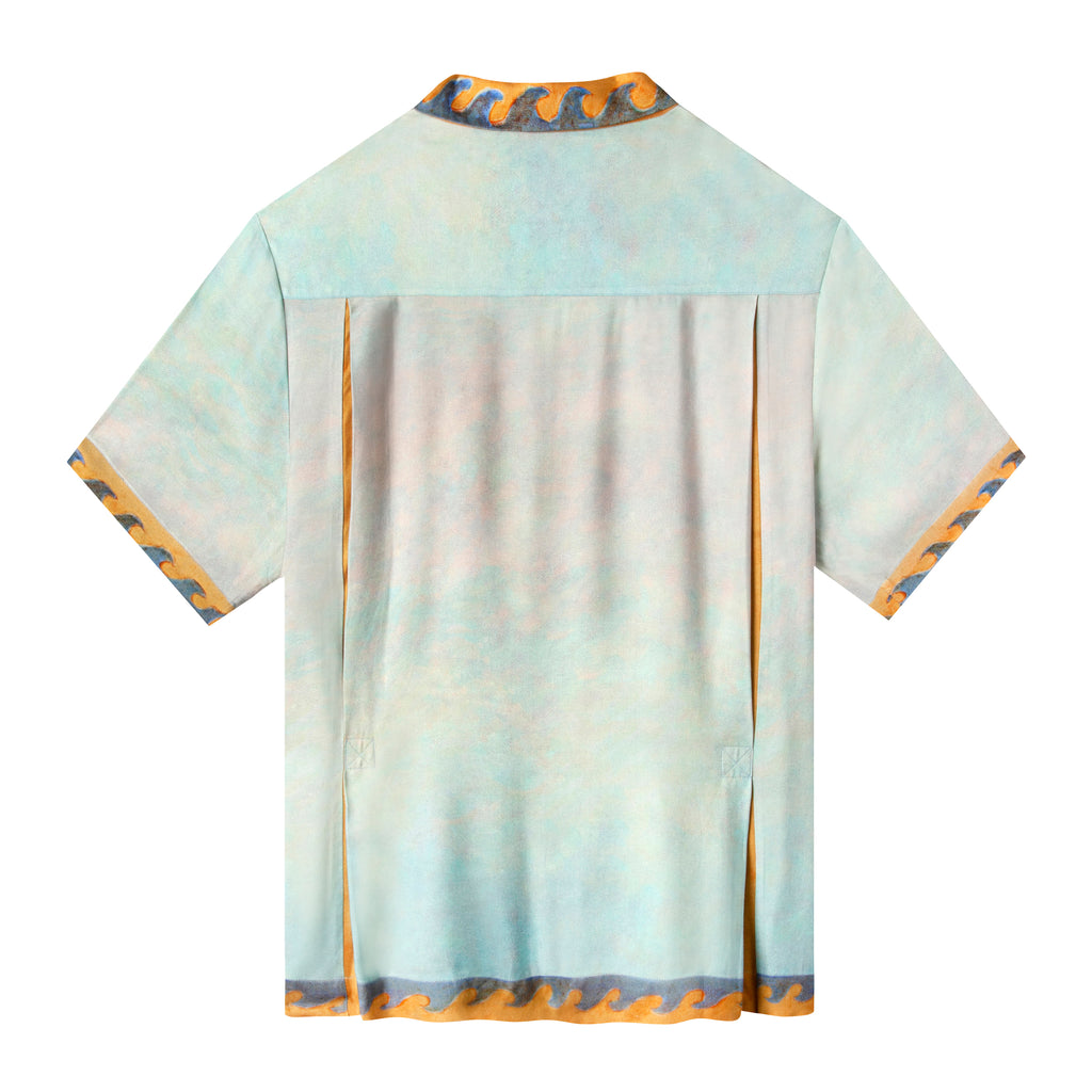 Back side of the shirt with gold paneling on each side of the shirt