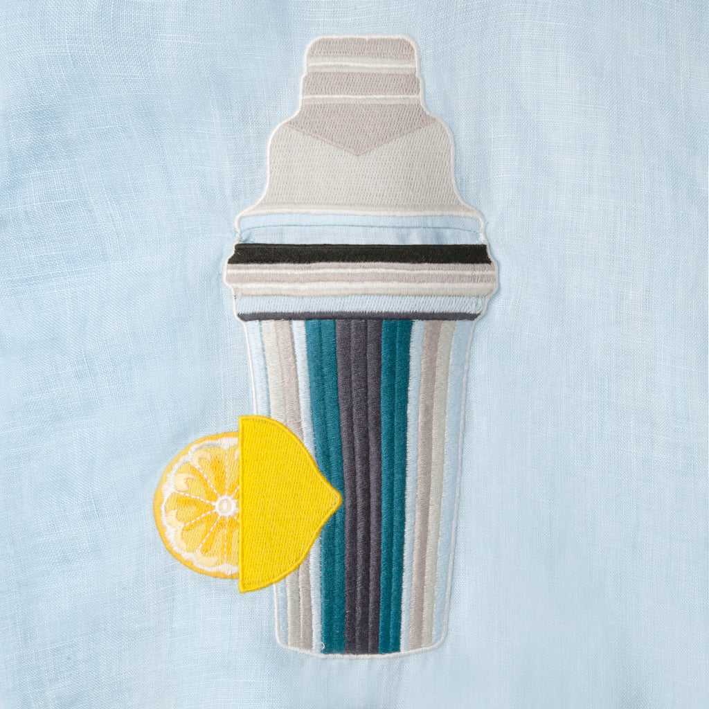 Close up of embroidered Martini shaker pocket with lemon