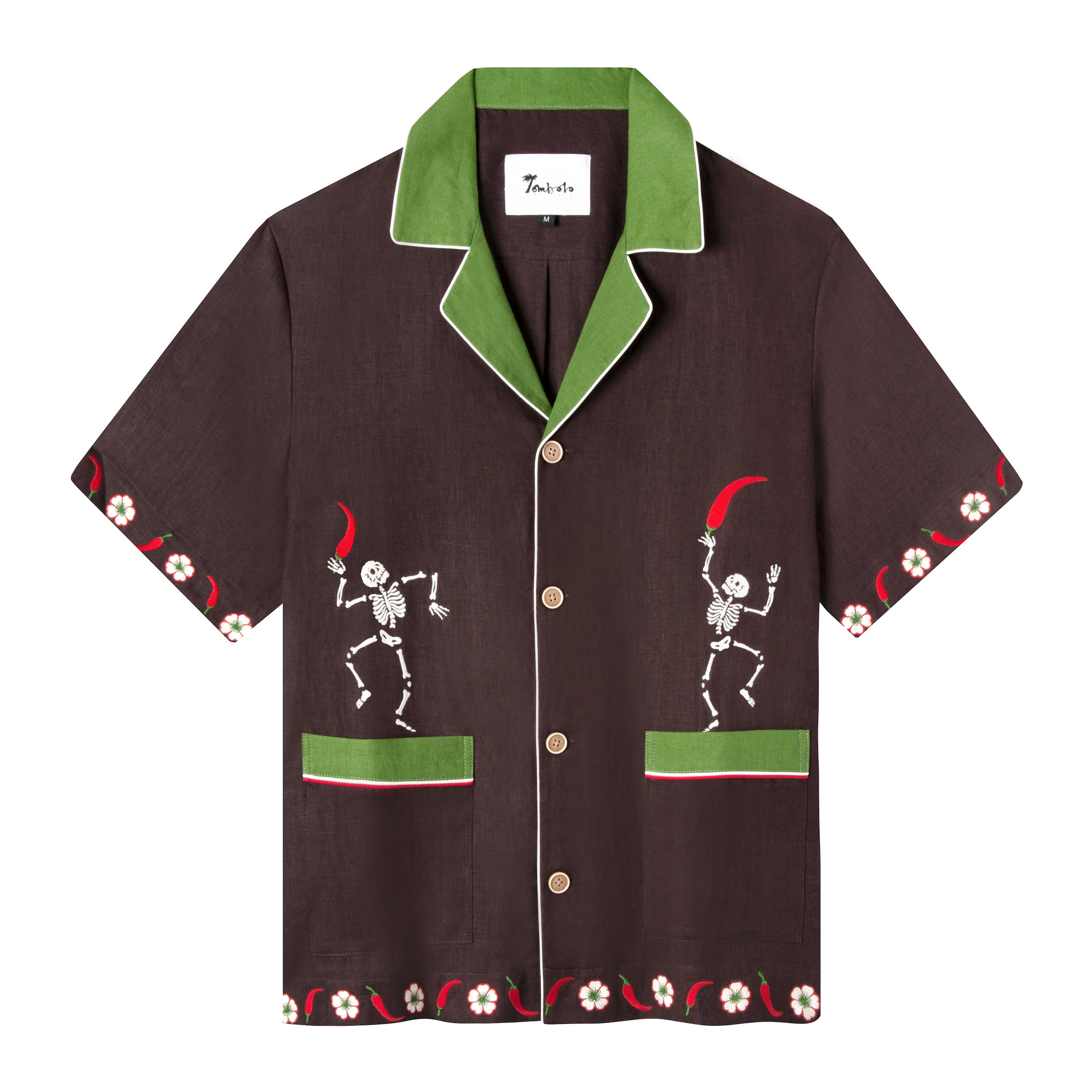 Casual, cabana style in brown linen with embroidered skeletons holding chili peppers on each front panel. Green combo color on collar and pocket strips.